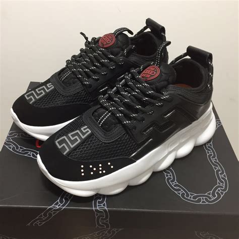 red and white versace chain reaction|Versace chain reaction black.